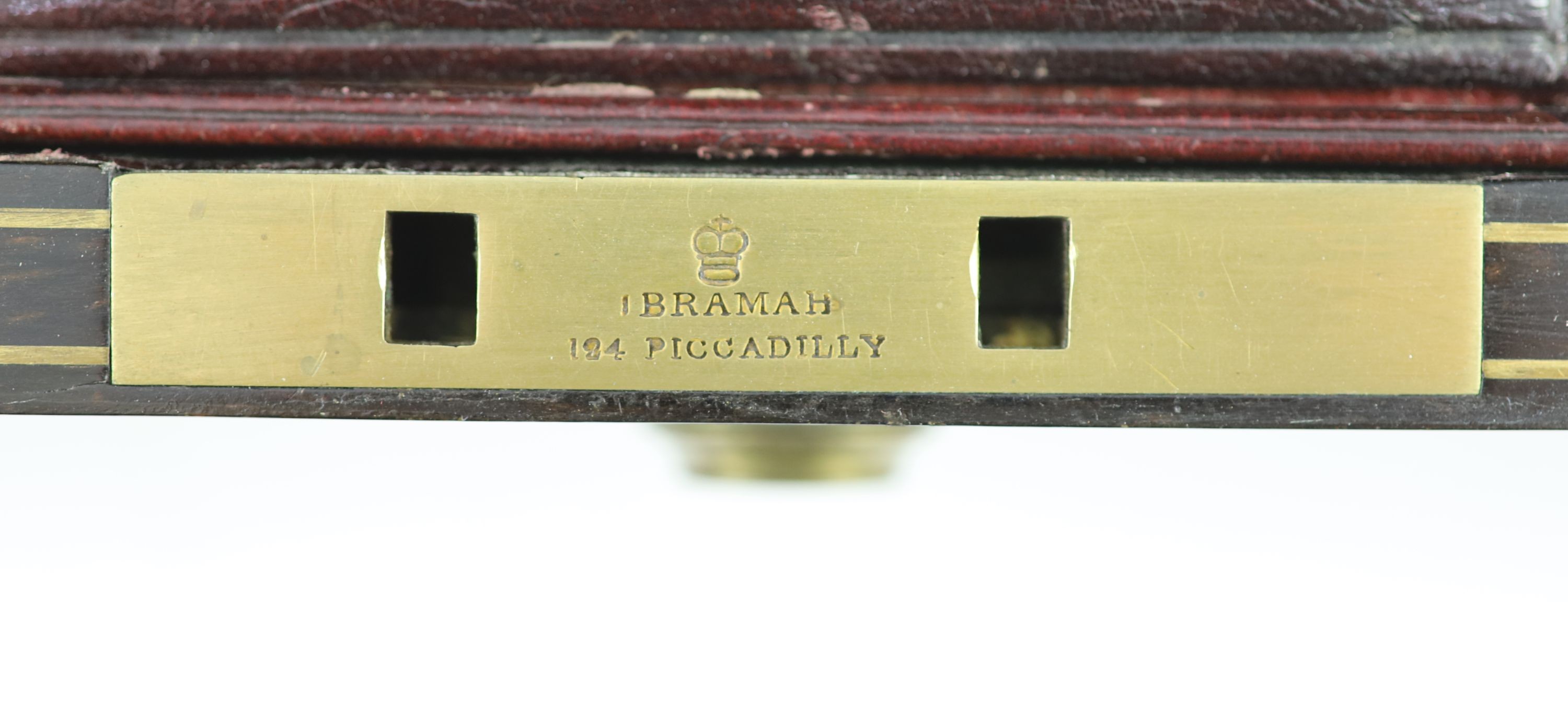 A good late William IV brass inlaid two handled coromandel wood travelling toilet set, containing eleven silver mounted glass jars etc.